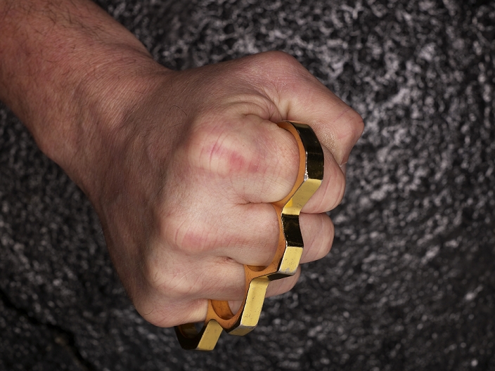 Fist with brass knuckles