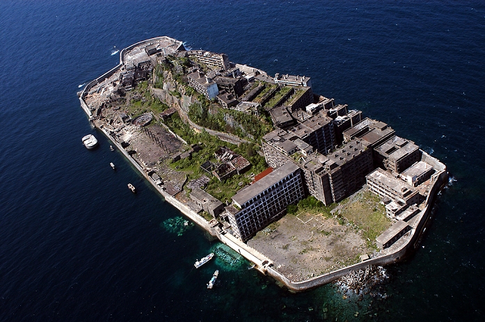 Industrial Revolution Heritage of Meiji Japan Recommended for Registration as a World Heritage Site  April 2004 photo  Hashima, Nagasaki, Japan. Also known as Gunkanjima  battleship island , it used to have coal mines and housed over 4,000 inhabitants. After it was abandoned in the mid 20th century the town turned into a ghost town. April 23, 2004.