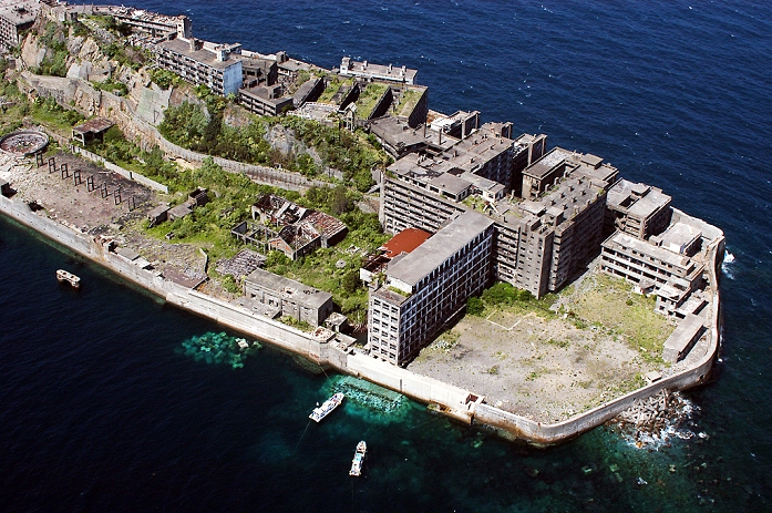 Industrial Revolution Heritage of Meiji Japan Recommended for Registration as a World Heritage Site  June 2004 photo  Hashima, Nagasaki, Japan. Also known as Gunkanjima  battleship island , it used to have coal mines and housed over 4,000 inhabitants. After it was abandoned in the mid 20th century the town turned into a ghost town. June 23, 2004.