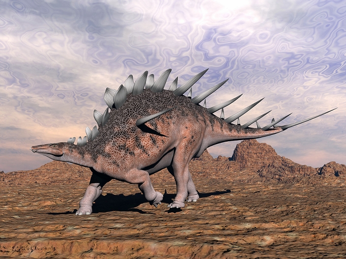 Kentrosaurus dinosaur walking in the desert.