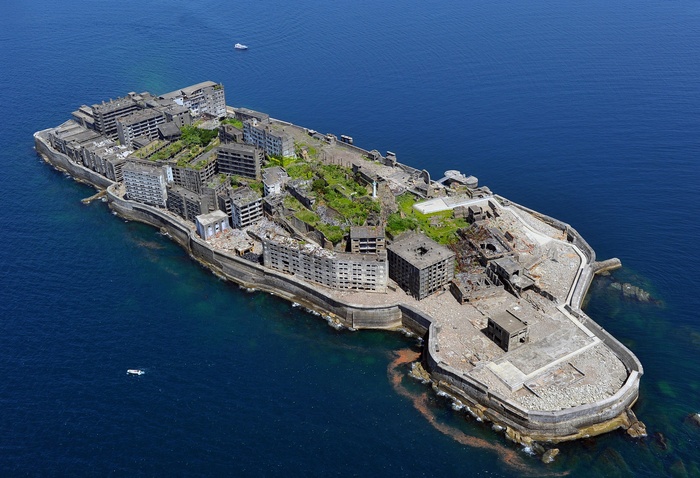 Hashima Island  Gunkanjima  in Takashima cho, Nagasaki City  Industrial Revolutionary Heritage of Meiji Japan: Kyushu Yamaguchi and Related Areas  recommended for registration as a World Cultural Heritage site by UNESCO. Hashima Island  Gunkanjima  in Takashima machi, Nagasaki City, Nagasaki Prefecture, Japan, April 25, 2015, photo by Takeshi Noda from a Head Office helicopter.