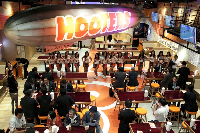 Hooters  5th store in Japan Opened at Shinjuku West Exit Members of staff greet guest and press members during the pre opening event for a new establishment in the Shinjuku District of Tokyo, Japan on May 15, 2015. Hooters first opened in Japan in 2010 and this new restaurant will be their fifth store. The new Shinjuku store will open to the public on May 18th.  Photo by Rodrigo Reyes Marin AFLO 