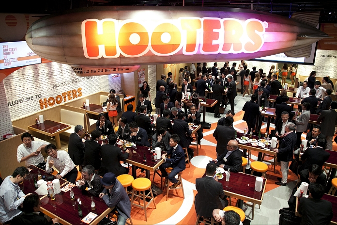 Hooters  5th store in Japan Opened at Shinjuku West Exit Members of staff takes orders from the guest and press members during the pre opening event for a new establishment in the Shinjuku District of Tokyo, Japan on May 15, 2015. Hooters first opened in Japan in 2010 and this new restaurant will be their fifth store. The new Shinjuku store will open to the public on May 18th.  Photo by Rodrigo Reyes Marin AFLO 