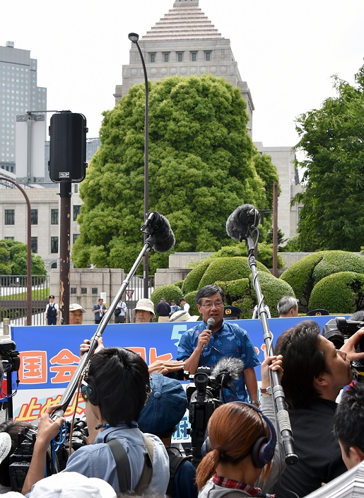 Oppose Henoko base relocation Thousands of people demonstrated around the National Diet May 24, 2015, Tokyo, Japan   Mayor Susumu Inamine of Nago City in Japan s sothernmost prefecture of Okinawa, addresses thousands of protesters outside the national Diet building in the heart of Tokyo opposing the planned relocation of U.S. Marine Corps Air Station to Henoko in Japan The plan formulated in 1996 between the Japanese and American governments The plan formulated in 1996 between the Japanese and American governments would move U.S. Marine Air Station Futenma from a populated neighborhood to a less developed area, but Okinawans worried about safety, crime and noise  Photo by Natsuki Sakai AFLO  AYF  mis 