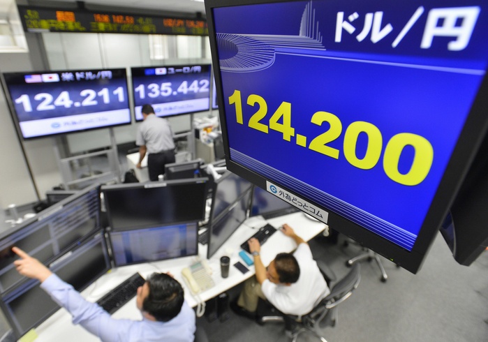 Monitor showing the yen exchange rate, which temporarily hit the 124 yen per dollar level. A monitor showing the yen exchange rate, which temporarily hit the 124 yen per dollar level, at Gaitame.com in Minato ku, Tokyo, May 28, 2015, 1:07 p.m. Photo by Takeshi Inokai.