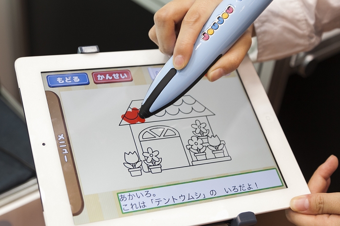 Tokyo Toy Show Opens One of the largest toy trade fairs in Japan An exhibitor paints on the tablet with a   JOUJOU  pen at the International Tokyo Toy Show 2015 in Tokyo Big Sight on June 18, 2015, Tokyo, Japan. Japan s largest trade show for toy makers attracts buyers and collectors by introducing the latest products from different toymakers from Japan and overseas. The toy fair showcases about 35,000 toys from 149 domestic and foreign companies and is held over four days.  Photo by Rodrigo Reyes Marin AFLO 