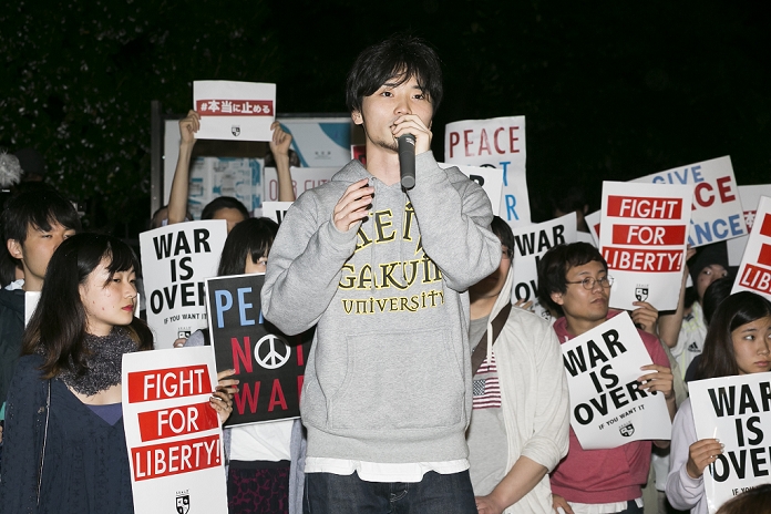 Students and Youth Demonstrate in Front of the National Diet against  War Legislation  Students and young people demonstrate in front of the National Diet Members of the Students Emergency Action for Liberal Democracy s  SEALDs  protest against the revision of the pacifist Article 9 outside the Parliament building on June 19, 2015, Tokyo, Japan. SEALDs is a voluntary activist group of teenagers and young people whose objectives are to protect freedom and democracy in Japan. The group organizes regular demonstrations outside the parliament building and is a successor to SASPL  Students Against Secret Protection Law  which protested against the protection of secrets law and the U.S. military base problem in Henoko, Okinawa.  Photo by Rodrigo Reyes Marin AFLO 