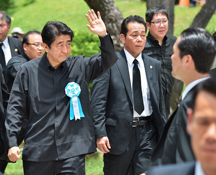 70th Anniversary of the Battle of Okinawa  Memorial Day Prime Minister and others attend memorial service for war dead Shinzo Abe, June 23, 2015, Itoman, Okinawa, Japan : Japan s Prime Minister Shinzo Abe waves to worshippers after the memorial service for all war dead of  battle of Okinawa  at the Peace memorial park in Itoman, Okinawa, Japan on June 23, 2015.  Photo by AFLO 