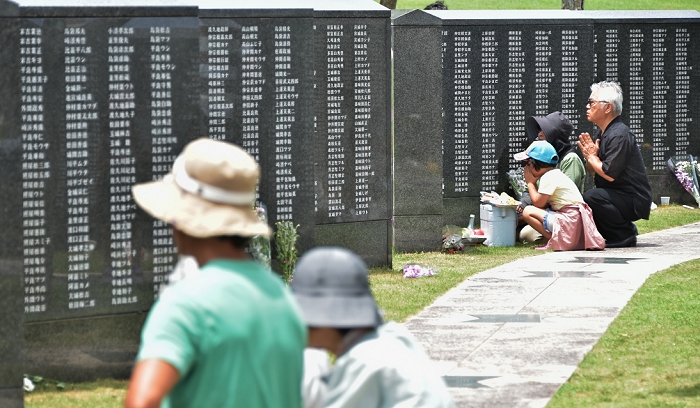 70th Anniversary of the Battle of Okinawa  Memorial Day Prime Minister and others attend memorial service for war dead Battle of Okinawa, June 23, 2015, Itoman, Okinawa, Japan : Worshippers pray for victims in front of the monument Cornerstone of Peace of bloody battle of Okinawa at the Peace memorial park in Itoman, Okinawa, Japan on June 23, 2015.  Photo by AFLO 