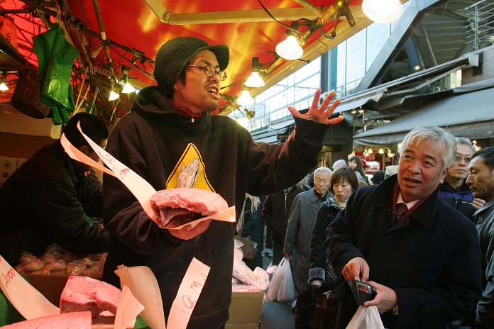 From the streets of the world Ueno Ameya Yokocho  December 28, 2005  December 28, 2005, Tokyo, Japan   The narrow streets of Ammeyoko get fully packed with thousands of shoppers seeking out ingredients for the year end holiday season. Ameyoko is a busy market streets where more than 500 small retailers, crammed into the narrow spaces under and on both sides of the elevated railroad tracks stretching some 500 meters from Ueno station, sell a wide ranging products, including fresh fish, meat, dried goods, clothes, footwear, cosmetics, precious metals, sporting and imported goods.  Photo by Haruyoshi Yamaguchi AFLO  VTY  mis 