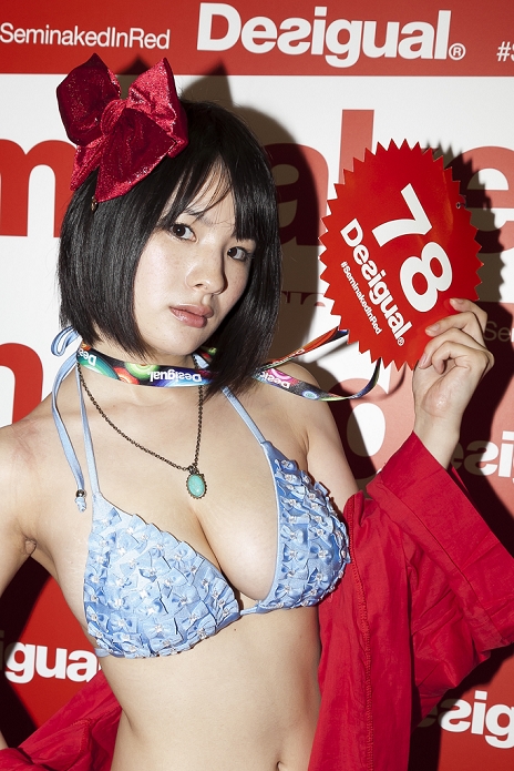 Swimwear Store Gives Away Merchandise Desigual s annual event A customer poses for the cameras during the   Seminaked in Red   event at Desigual Harajuku store on June 27, 2015, Tokyo, Japan. Spanish fashion label s promotional event offered the first 100 participants who arrived wearing swimsuits a discount on all in store items. According to the organizers around 100 people lined up over night despite the heavy rain.  Photo by Rodrigo Reyes Marin AFLO 