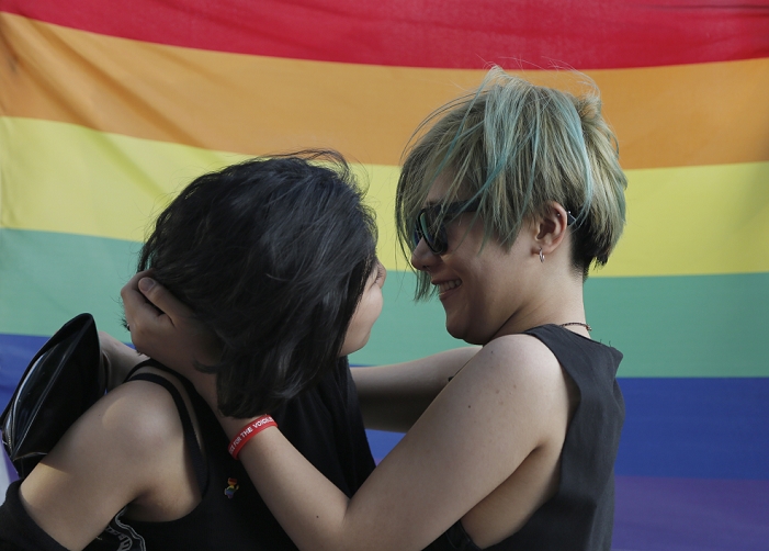 Gay Parade in Seoul, South Korea Clashes with opponents Gay pride parade, Jun 28, 2015 : A couple kiss during the Korea Queer Festival, a gay pride parade in Seoul, South Korea as conservative Christians  not seen in photo  watch them. Thousands of people participated in the annual gay pride parade as they celebrated the U.S. Supreme Court s decision allowing same sex couples nationwide to wed, while hundreds of conservative Christians were denouncing them on Sunday.   Photo by Lee Jae Won AFLO   SOUTH KOREA 