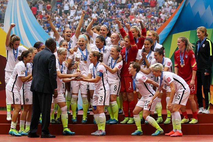 2015 FIFA Women s World Cup USA Wins 3rd title in 4 tournaments United States team group  USA , JULY 5, 2015   Football   Soccer : Abby Wambach and Christie Rampone of the United States receive the trophy from FIFA Senior Vice President Issa Hayatou as they celebrate with their teammates after winning the FIFA Women s World Cup Canada 2015 Final match between United States 5 2 Japan at BC Place in Vancouver, Canada.  Photo by AFLO 