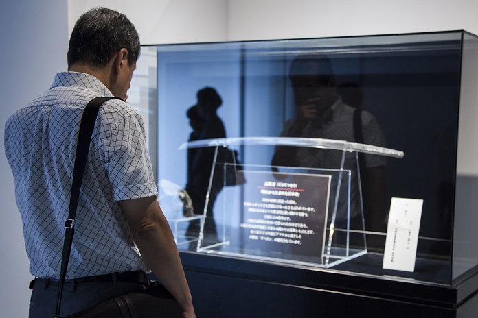 Japanese sword made from iron meteorite Permanent exhibit of the  Heavenly Iron Sword A visitor looks at the   Sword of Heaven   made from an iron meteorite at the   Tokyo Skytree Town Campus   in Japan s tallest building on July 13, 2015, Tokyo, Japan. The sword was forged by Yoshindo Yoshiwara from an iron meteorite, which fell from the space about 450 million years ago. It is said to symbolizes the relationship between human technology and space. The object is part of the attractions of   Tokyo Skytree Town Campus   that showcases Chiba Institute of Technology s robotic technologies and planetary exploration.  Photo by Rodrigo Reyes Marin AFLO 