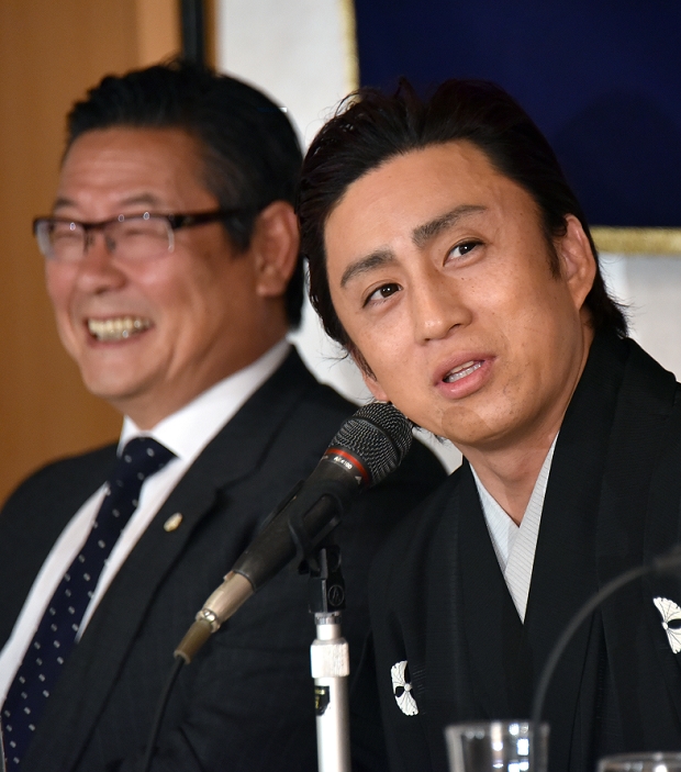 Somegoro Ichikawa and Junichi Sakomoto, Jul 14, 2015 : Tokyo, Japan - Clad in Japanese formal attire, popular kabuki actor Ichikawa Somegoro expresses his wishes for his upcoming trip to Las Vegas during a news conference at Tokyo's Foreign Correspondents' Club of Las Vegas expresses his wishes for the upcoming trip to Las Vegas during a news conference at Tokyo's Foreign Correspondents' Club of Japan on Tuesday, July 14, 2015. Ichikawa will appear in August on stage in front of the world-famous fountains at the Bellagio Hotel in Las Vegas, Nev. entertainment capital of the world, in his performance of the kabuki classic, 