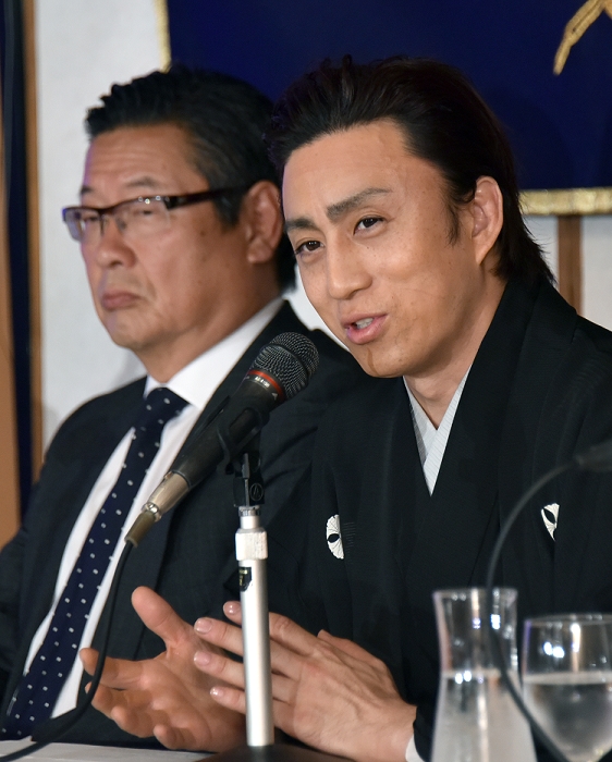 Somegoro Ichikawa and Junichi Sakomoto, Jul 14, 2015 : Tokyo, Japan - Clad in Japanese formal attire, popular kabuki actor Ichikawa Somegoro expresses his wishes for his upcoming trip to Las Vegas during a news conference at Tokyo's Foreign Correspondents' Club of Las Vegas expresses his wishes for the upcoming trip to Las Vegas during a news conference at Tokyo's Foreign Correspondents' Club of Japan on Tuesday, July 14, 2015. Ichikawa will appear in August on stage in front of the world-famous fountains at the Bellagio Hotel in Las Vegas, Nev. entertainment capital of the world, in his performance of the kabuki classic, 