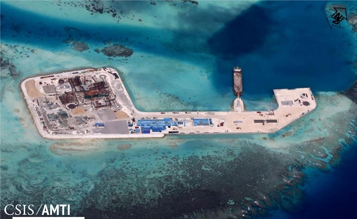 Nansha Islands, Hughes Reef  December 12, 2014   Courtesy photo  A handout photo, taken Hughes Reef in the South China Sea, by provided by CSIS Asia Maritime Transparency Initiative on December 12, 2014. Construction on Hughes Reef began in summer 2014. What was once a 380 square meter concrete platform on stilts has been expanded to a 75,000 square meter island through dredging and reclamation activity.  Photo by CSIS Asia Maritime Transparency Initiative Handout AFLO  FOR EDITORIAL USE ONLY.