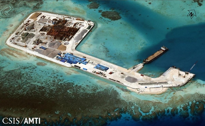 Nansha Islands, Hughes Reef  November 15, 2014   Courtesy photo  A handout photo, taken Hughes Reef in the South China Sea, by provided by CSIS Asia Maritime Transparency Initiative on November 15, 2014. Construction on Hughes Reef began in summer 2014. What was once a 380 square meter concrete platform on stilts has been expanded to a 75,000 square meter island through dredging and reclamation activity.  Photo by CSIS Asia Maritime Transparency Initiative Handout AFLO  FOR EDITORIAL USE ONLY.