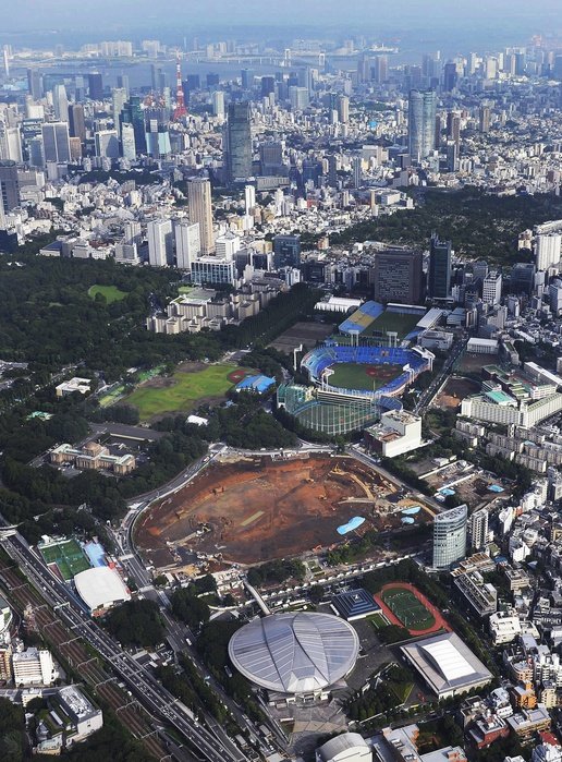 Proposed site for new national stadium Construction plans have been scrapped. The planned construction site of the new National Stadium  foreground  is photographed from a helicopter at the headquarters on July 17, 2015 in Shinjuku, Tokyo.