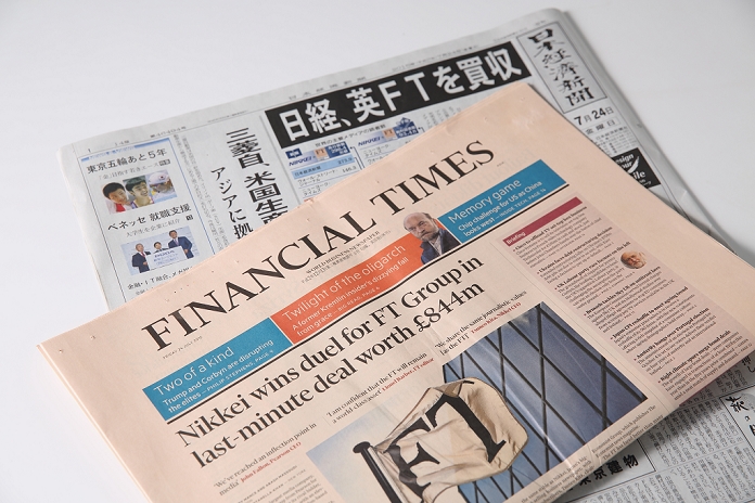 Financial Times  U.K.  Nikkei to buy for 160 billion yen July 24, 2015, Tokyo, Japan   Japan s business daily newspaper, the Nikkei or Nihon Keizai Shimbun and Financial Times newspaper front pages are pictured in Tokyo, on July 24, 2015. Nikkei Inc. announced on Thursday July 23rd the buy out of the leading British newspaper Financial Times Group from the educational services group Pearson PLC for 844 million pounds  about  1.3 billion,  with a transaction expected to close in the fourth quarter of 2015 and expected to be one of the biggest acquisitions of an overseas business by a Japanese media group ever.  Photo by Yosuke Tanaka AFLO 