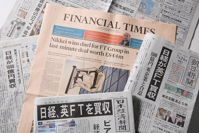 Financial Times  U.K.  Nikkei to acquire for 160 billion yen July 24, 2015, Tokyo, Japan   Japan s business daily newspaper, the Nikkei or Nihon Keizai Shimbun and Financial Times newspaper front pages are pictured in Tokyo, on July 24, 2015. Nikkei Inc. announced on Thursday July 23rd the buy out of the leading British newspaper Financial Times Group from the educational services group Pearson PLC for 844 million pounds  about  1.3 billion,  with a transaction expected to close in the fourth quarter of 2015 and expected to be one of the biggest acquisitions of an overseas business by a Japanese media group ever.  Photo by Yosuke Tanaka AFLO 