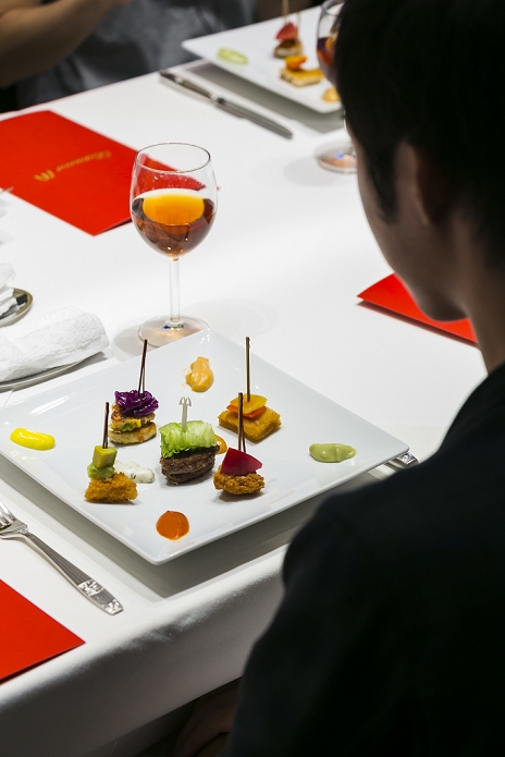 Mac s Becomes a Fine Dining Restaurant A one night only commemorative event A customer enjoys eating a McDonald s special dinner created by chef Masayo Waki during a   Restaurant M   event in the posh Roppongi Hills area on July 27, 2015, Tokyo, Japan. 20 chosen diners  from 8,300 applications  ate a special multi course dinner created by the celebrity chef using ingredients from the restaurant chain s regular menu. The special one night only event was organized to celebrate the launch of its new summer menu   Fresh Mac,   which features fresh vegetables. The five course meal served on a white tablecloth with plates and proper cutlery included a Vichyssoise en Pommes de terre de McDonald, Mousse au Poivron Rouge, Salade en Gelee aux Legumes de McDonald, Cinq Pinchos des McDonald Patties avec leur Sauces, a choice of main dish including the Fresh Mac Bacon Lettuce Burger, and a McFlurry Mixed Berry Oreo dessert with a Premium Roast Coffee.  Photo by Rodrigo Reyes Marin AFLO 