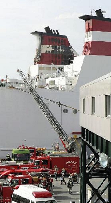 Ferry fire in Nanko, Osaka, Japan. Fire broke out inside the chimney while the ferry was docked. One of the chimneys  back  of the  Sunflower Aibori  has been blackened  8:21 a.m., July 26, 2009, in Suminoe Ward, Osaka City .