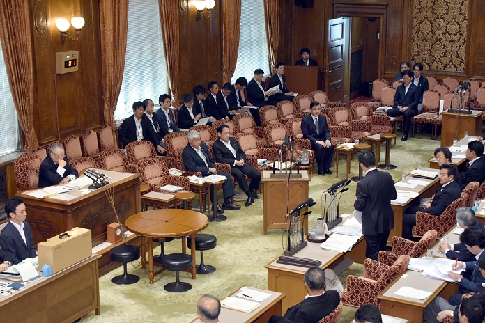 Aide Isozaki apologizes for remarks by a special committee member of the House of Councillors. August 3, 2015, Tokyo, Japan   Tetsuro Fukuyama, standing at right, of the opposition Democratic Party of Japan, fires questions to Yosuke Isozaki, seated at background right, a senior adviser to Japanese Prime Minister Shinzo Abe as he is summoned as an unsworn witness by a House of Councillors special panel on security legislation in Tokyo on Monday, August 3, 2015. Isozaki said recently that the legality of the contentious security bills currently being deliberated in the upper house was unimportant as was their consistency with the Constitution. His comment infuriated the opposition camp, which is now demanding his resignation.  Photo by Natsuki Sakai AFLO  AYF  mis 