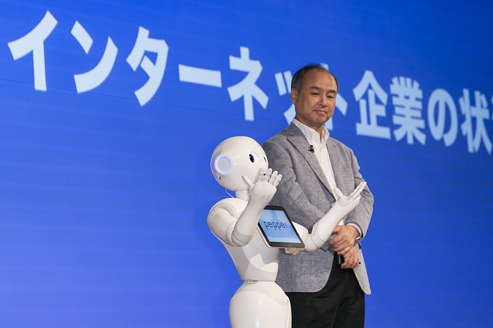 SoftBank net profit up 2.8 times Pepper  announces financial results  L to R  Robot Pepper and SoftBank Chairman and CEO Masayoshi Son present the first quarter earnings  April June 2015  for SoftBank Group Corp. at the Prince Hotel in Tokyo, Japan, August 6, 2015. SoftBank Group reported a rise in operating profits to 343.6 billion yen   2.75 billion  from 319.4 billion a year ago. Mr. Son said net profit rose to 213.38 billion   1.71 billion  nearly triple the 77.57 billion reported a year earlier. This is the first time that Son has shared microphones with a robot to report earnings.  Photo by Rodrigo Reyes Marin AFLO 