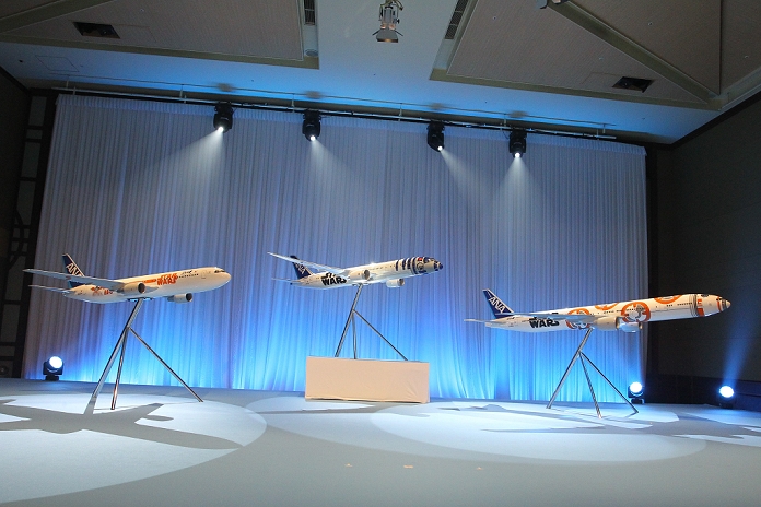 Star Wars Special Aircraft ANA to begin service in Oct. August 18, 2015, Tokyo, Japan : Japan s All Nippon Airways presents three designs for its Star Wars themed airplanes during a press conference in Tokyo, Japan. ANA, which signed a five year promotion license contract with the Walt Disney Co. last April, said that the Star Wars flights will feature the movie characters also in the headrest covers, napkins, cups and in flight decorations. The iconic R2 D2 droid from the original Star Wars movies, as well as the new droid BB 8, which will appear in new movie  Star Wars: The Force Awakens,  will feature on the airplane liveries, and all 6 of the Star Wars films to date will be included in the in flight entertainment system. According to ANA, some of the Star Wars themed jetliners might also operate on international routes.  Photo by Pasya AFLO 