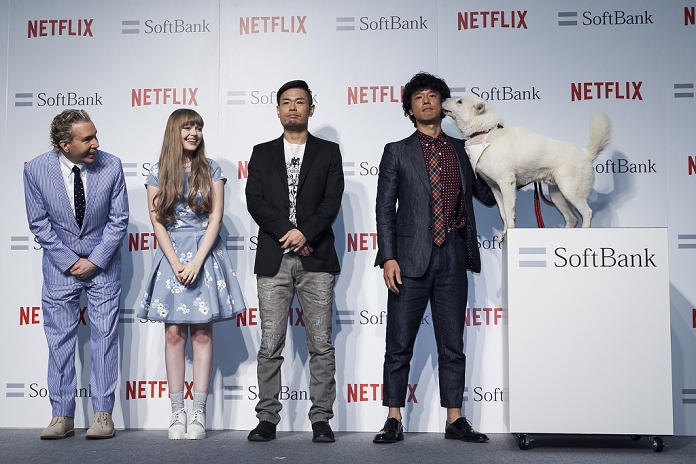  SB announces new service Business alliance with Netflix  L to R  American TV producer Dave Spector, model Dakota Rose, comedians Hiroshi Shinagawa and Tomoharu Shoji  and SoftBank s mascot dog   Otosan    father  pose for the cameras during a media event to announce a business alliance for the Netflix video delivery service in Japan on August 24, 2015, Tokyo, Japan. From September 2nd SoftBank s 37 million users will be able to access a Netflix Inc. subscription starting at 650 JPN  5.34 USD  for a Standard SD plan. The companies also plan to work on joint content creation projects.  Photo by Rodrigo Reyes Marin AFLO 