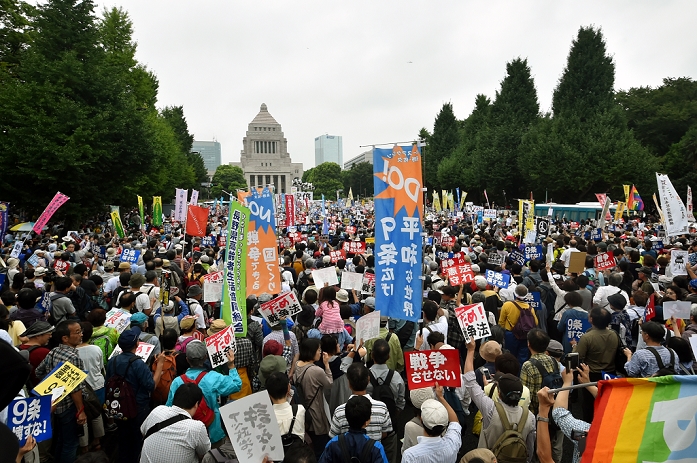 Demonstration against the Security Law Tens of thousands gathered in front of the Diet August 30, 2015, Tokyo, Japan  Tens of thousands of protesters carry signs expressing opposition to the government sponsored national security related bills being deliberated in the Diet during a mass demonstration in the drizzling rain in the heart of Tokyo on Sunday, August 30, 2015.  Photo by Natsuki Sakai AFLO  AYF  mis 