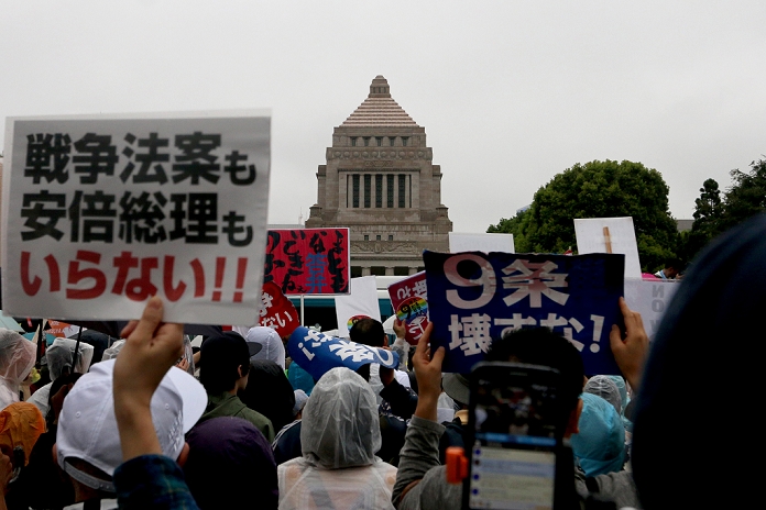 Demonstration against the Security Law Tens of thousands gathered in front of the Diet August 30, 2015, Tokyo, Japan   Demonstrators take part in a mass rally against Japan s Prime Minister Shinzo Abe s security bill in front of the parliament  in Tokyo on Sunday, August 30, 2015.  Photo by Yuriko Nakao AFLO 