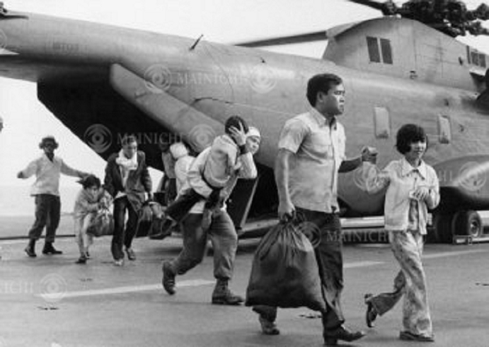 Vietnam War  April 29, 1975  Vietnamese father and son who escaped on the aircraft carrier USS Okinawa