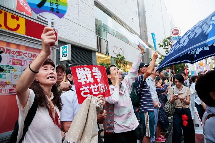 Demonstration against the Security Bill in Shinjuku Filling the pedestrian mall Protesters attend the rally against the government s controversial security bills which would expand the remit of the Self Defense Forces in Tokyo s Shinjuku district on September 6, 2015.  Photo by AFLO 