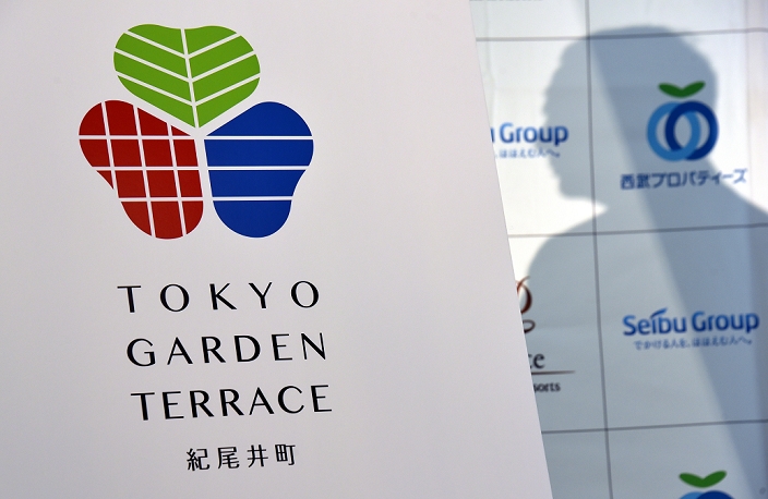 Tokyo Garden Terrace Logo unveiled at the topping out ceremony September 16, 2015, Tokyo, Japan   Takashi Goto, president of the Seibu Holdings, unveils the logo of Tokyo Garden Terrace, a new commercial complex being constructed in the heart of Toko, where the former Grand Prince Hotel Akasaka once stood majestically, on Wednesday, September 16, 2015. Upon completion in 2016, the new Tokyo landmark, operated by the Seibu Holdings, will include office, residential, commercial, hotel and leisure space.  Photo by Natsuki Sakai AFLO  AYF  mis 