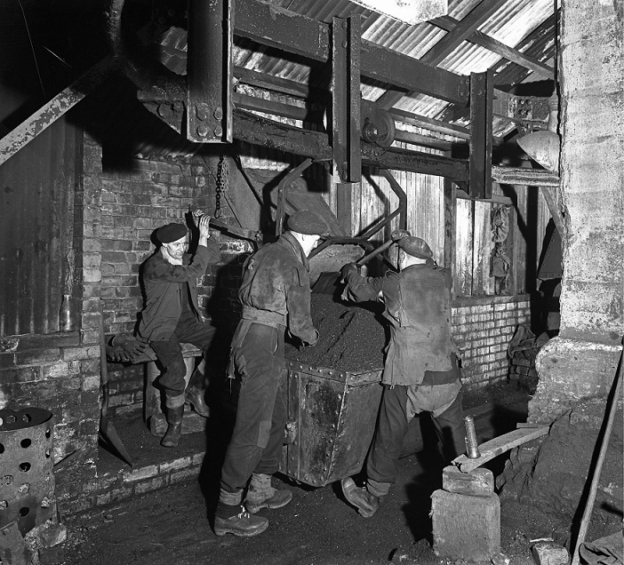 Coal Miner, England  1956  Miners working in Mitchell Main Colliery near Barnsley, South Yorkshire, 1956. During a dispute in 1893, it was rumored that strike breakers were working inside the mine after a pit lock out.