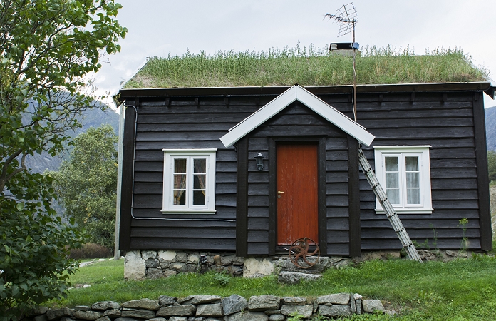Laerdal Norway grass roof house in mountains isolated to save heat and energy traditional PR-6