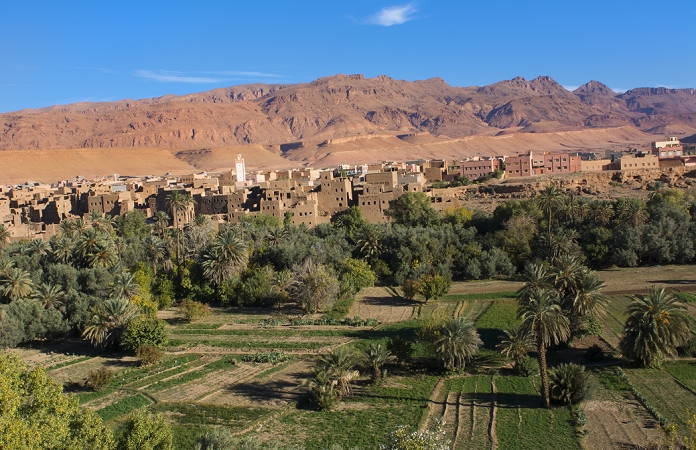 Morocco Atlas Mountains Tinghir Oasis and  village with beautiful mountains and green palm trees