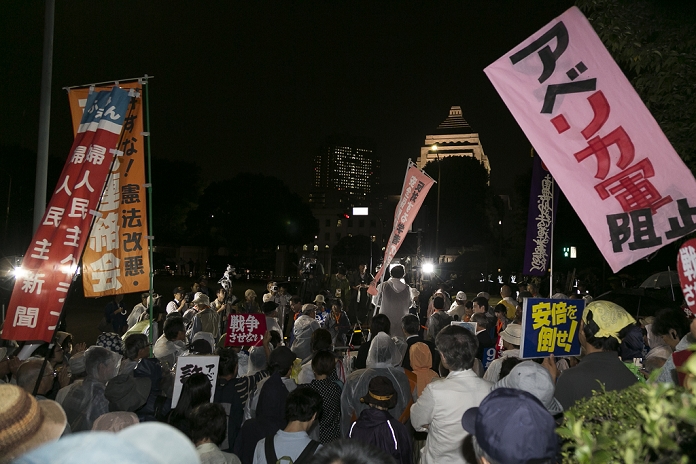 Protest against the passage of the Security Bill Demonstration Continues in Front of the Diet Protesters hold placards with anti war messages and chant against Prime Minister Shinzo Abe in front of the National Diet Building on September 24, 2015, Tokyo, Japan. Although new controversial security bills received final parliamentary approval on September 19, many Japanese still believe that the new legislation goes against the Constitution and are unhappy with the way that the Abe government pushed it through. According to organizers 5000 people joined the demonstration to express their opposition to the Abe government.  Photo by Rodrigo Reyes Marin AFLO 