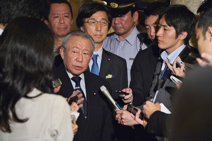 Security Bill comes to a close for a vote Passed by the House of Councillors Special Committee Yoshitada Konoike, Security related bills, upper house, September 17, 2015, Tokyo, Japan : Yoshitada Konoike, chairman of the upper house special committee on security answer reporter s question after upper house special committee for the security related bills in Tokyo, Japan on September 17, 2015.