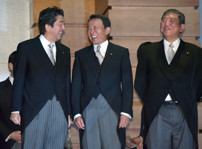Third Abe Cabinet Reshuffle Commemorative photo at the Prime Minister s Office October 7, 2015, Tokyo, Japan   Japan s Prime Minister Shinzo Abe, left, jokes with Finance Minister Taro Aso, center, and Shigeru Ishiba, minister in charge of Vitalizing Local Economy Shigeru Ishiba, during a photo session with his Cabinet ministers at his office in Tokyo on Wednesday, October 7, 2015. minister in charge of Vitalizing Local Economy Shigeru Ishiba, during a photo session with his Cabinet ministers at his office in Tokyo on Wednesday, October 7, 2015 October 7, 2015, following a reshuffle of his Cabinet. Photo by Natsuki Sakai AFLO  AYF  mis 