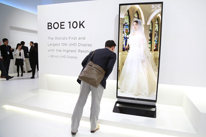 CEATEC JAPAN  opens Comprehensive IT   Electronics Exhibition A visitor looks at the   BOE 10K UHD   display at CEATEC Japan 2015 on October 7, 2015, Tokyo, Japan. CEATEC Japan is an electronics and IT exhibition, showing the latest technology in various fields such as transport, healthcare and robotics. This year there are 531 exhibitors from 19 different countries at the exhibition which runs from October 7 to 10.  Photo by Rodrigo Reyes Marin AFLO 