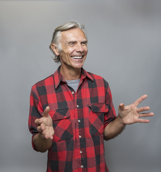 Senior Male Smiling older Caucasian man gesturing