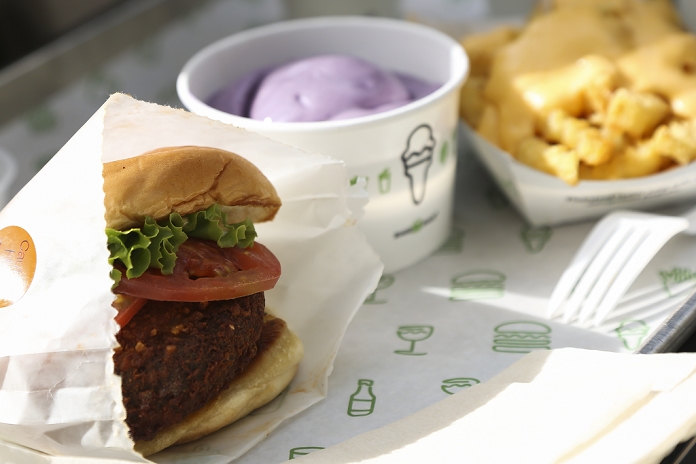 Shake Shack  from New York The first store opened in Japan Shake Shack food on display during the opening ceremony for their fist Japanese store located in Meiji Jingu Gaien Park on November 13, 2015, Tokyo, Japan. Approximately 400 people lined up to get a first taste of the ShackBurger, SmokeShack or Shack cago Dog. New openings of US food chains are big business in Japan, and the store was featured on Japanese breakfast shows. According  to the organisers, people started lining up from  9:30 pm the previous night.  Photo by Rodrigo Reyes Marin AFLO 
