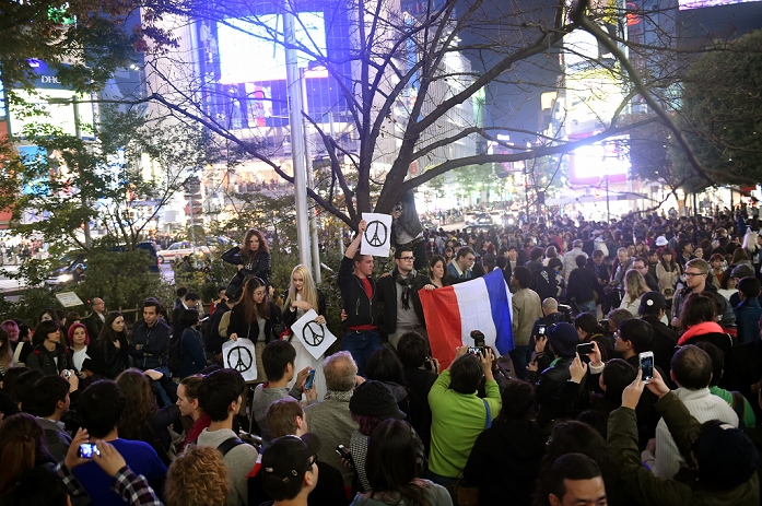 Protest Demonstration against the Terrorist Attacks in Paris French residents and supporters in Shibuya November 15, 2015, Tokyo, Japan   Holding French flags and signs showing Peace for Paris, French residents in the nation s capital and Japanese supporters sing together La Marseillaise in an anti terror demonstration in Tokyo s Shibuya on Sunday, November 15, 20 15, 2015  Photo by Natsuki Sakai   AYF  may be a good thing for the French residents for Paris and protest against terrorist attacks in Paris that has left 129 dead and more than 350 injured. AFLO  AYF mis 