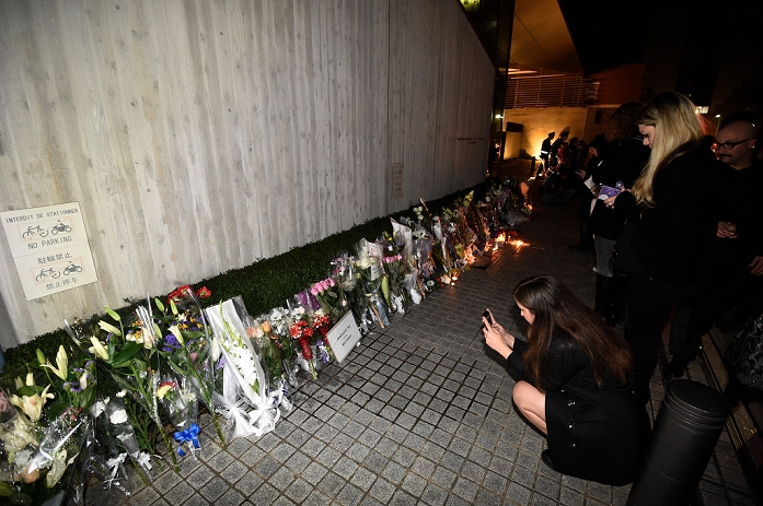 Paris Terrorist Attacks. Mourning the Victims in Tokyo Candles and flowers are left in remembrance of the victims of the Paris attacks outside the the French Embassy on November 15, 2015, in Tokyo, Japan.  Photo by AFLO 