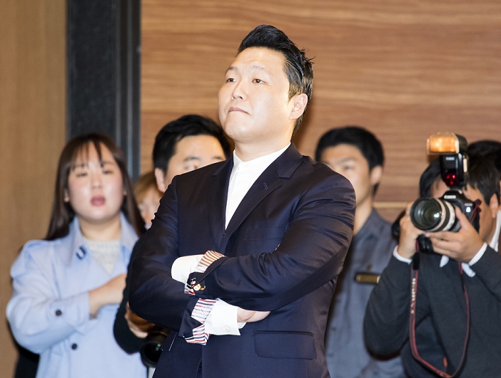 Psy PSY, Nov 30, 2015 : South Korean singer PSY  C  looks his new music videos played on a screen during a press conference about his new 7th album in Seoul, Psy s 7th album has nine tracks with two leading tunes,  Napal Baji  Bellbottoms   and  Daddy . International artists such as will.i.am, Ed Sheeran and Zion T are featured as guest performers in the album. Photo by Lee Jae Won AFLO   SOUTH KOREA  Psy PSY, Nov 30, 2015 : South Korean singer PSY  C  looks his new music videos played on a screen during a press conference about his new 7th album in Seoul, South Korea. Psy s 7th album has nine tracks with two leading tunes,  Napal Baji  Bellbottoms   and  Daddy . International artists such as will.i.am, Ed Sheeran and Zion T are featured as guest performers in the album.