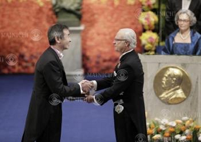 Nobel Prize 2015. Award ceremony in Stockholm Takaaki Kajita receives his physics medal and certificate from King Carl XVI Gustaf of Sweden  right  at the Nobel Prize ceremony at the Concert Hall in Stockholm, December 10, 2015, 4:54 p.m.  Representative photo 