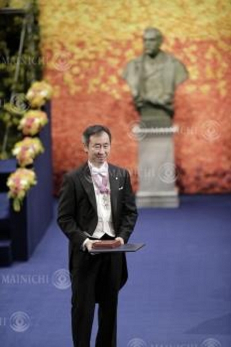Nobel Prize 2015. Award ceremony in Stockholm Takaaki Kajita, director of the Institute for Cosmic Ray Research at the University of Tokyo, receives his medal and certificate at the Nobel Prize ceremony at the Concert Hall in Stockholm, December 10, 2015, 4:54 p.m. Representative photo.